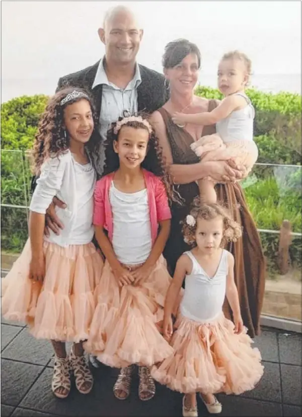 Sen-Constable Christopher Plummer with his wife, Juliet, and four daughters before his illness.